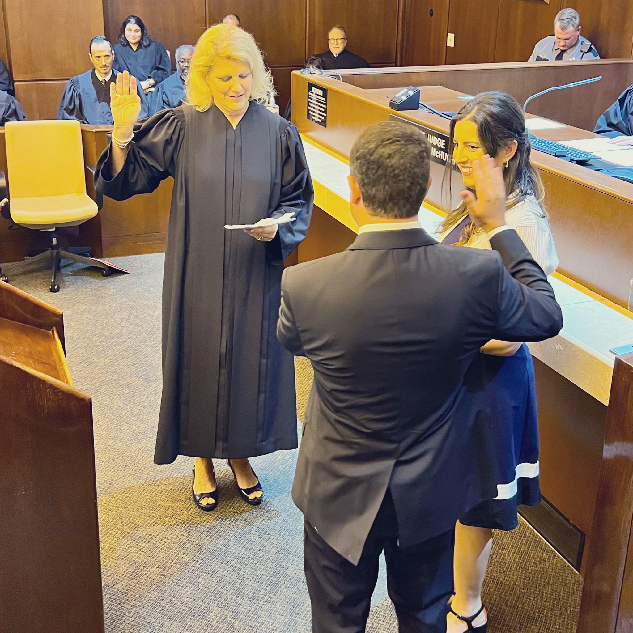 Judge Sheri Polster Chappell giving the oath of office to Judge Cohen